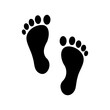 © Laboni49 - Two black footprints on a white background suggest a path or journey