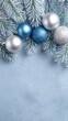 © Nunthaphuk - Elegant Christmas Background Design for Seasonal Marketing – Elegant Christmas Background with Blue and Silver Ornaments on Frosted Pine Branches