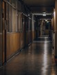 © Ningjing - Darkened hospital corridor at night with faint medical equipment and empty stretch of floor