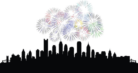 City skyline silhouette with colorful fireworks exploding above the buildings