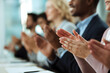 © SuperGlück - Audience claps enthusiastically during a presentation in a modern conference room in the afternoon, celebrating a successful speaker's engaging discussion