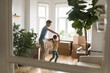 © fizkes - Loving millennial father dancing with little daughter at moving day