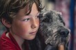 © Vitalii Shkurko - A boy with curly hair leans gently against a large, friendly dog in a warm, inviting space. Both exude a sense of calm and companionship while enjoying each others presence