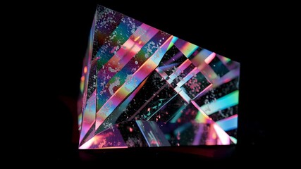 Abstract animation, iridescent crystal on black background, 4k seamless looped video, 3d render
