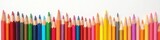 Array of vibrant colored pencils arranged neatly against a stark white background , colored pencils, isolated, saturation