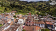Granada, Antioquia - Colombia. June 28, 2025. Panoramic drone view of the town's main church
