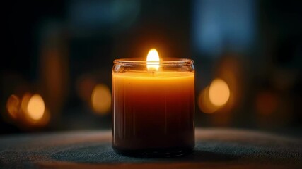 Wall Mural - Concentrated medium shot of a candle burning at both ends surrounded by soft outoffocus shadows evoking feelings of burnout and depleted energy in conceptual art style.