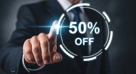 Businessman touches screen displaying 50% off sale and discount promotion button