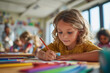 © EricMiguel - Focused young girl coloring with pencil in bright classroom surrounded by fellow students during art activity