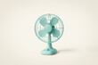 © DBFilms - Minimalistic mint green table fan with a retro design, centered against a clean beige background, blending simplicity and function.