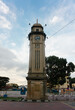 Majestic view of Menara Jam Besar, an iconic landmark in Sungai Petani, Kedah, Malaysia, under blue sky.