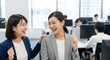 © Stingray_Japan - トラブル解決：問題が解決してお互いに喜び合う日本人女性社員たち