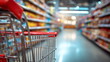 © xuxu - Shopping cart in a grocery store aisle. View from inside of empty supermarket trolley. Retail buying concept for consumer.