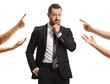 © Ljupco Smokovski - Pensive businessman and hands around scolding and accusing
