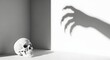 © MST.ANTOR MONI AKTER - A human skull sits in a stark, minimalist room as a monstrous claw hand casts a menacing shadow on the wall, symbolizing death and horror