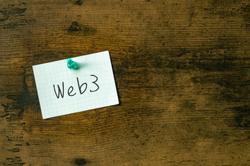 there is a piece of paper with the word web3. it is as an eye-catching image.