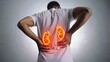 © mevideo - Man holding lower back in pain with a digital illustration of glowing kidneys, symbolizing kidney disease, back pain, urinary problems, renal health issues, medical diagnosis, and healthcare awareness