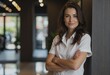 © Aliaksandr Barouski - Wellness administrator confidently posing near salon facility entrance