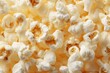 © Orbit - Close-up of numerous fluffy popcorn kernels