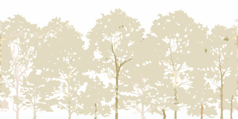 Softly blended silhouette of trees in a forest landscape