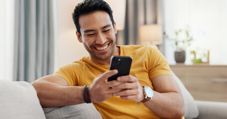 Mobile, relax and happy man in home for internet, social media post and reading news. Cellphone, living room and person with app for online text, communication and check message with notification