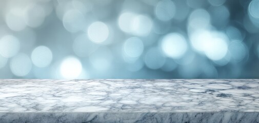 The marble countertop against soft blue bokeh background for elegant product display
