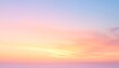 © ernawatima - A serene sunset sky with soft pastel hues of pink, orange, and yellow blending smoothly into each other, casting a warm, peaceful glow over the horizon and evoking calmness and natural beauty.