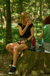 © Xalanx - Woman eating snack in forest break