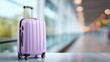 © Iaroslav - Christmas Modern purple suitcase standing in airport terminal, symbolizing travel, journeys, and experiences of new excitement