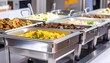© sun - Buffet with various dishes in stainless steel chafing dishes