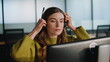 © stockbusters - Call operator hand taking headset closeup. Online professional greeting customer