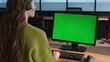 © stockbusters - Call center green computer screen closeup. Woman service operator talking mockup