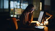 © stockbusters - Late economist analyzing charts on desktop screen at night hours business center