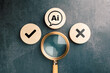 © patpitchaya - Magnifying glass examining AI symbol with check and cross mark representing right and wrong information detection, artificial intelligence verification concept, accuracy and error review