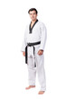 © suphaporn - Confident young martial artist man wearing traditional white taekwondo uniform with black belt standing barefoot isolated on a transparent background showing discipline strength self defense concept