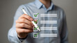 © DreamyDesignsCo - Professional checking off tasks on a to-do list with a stylus in a modern office setting