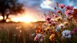 ©  Shomixer - A picturesque field of wildflowers bathes in the golden light of sunset, capturing the beauty of nature and evoking feelings of peace and serenity in this enchanting scene.