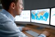 © กาซือมะ สาและ - A logistics analyst reviewing global shipment data and supply chain charts on multiple monitors