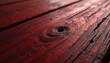 © Vadym - Richly textured red wood surface with intricate grain patterns highlighted in natural light. Features prominent knot with dark center, fine cracks. Natural material, with rustic charm, organic