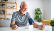 © Mohammad - Senior Man Monitoring Blood Pressure at Home A Guide to Home Blood Pressure Monitoring