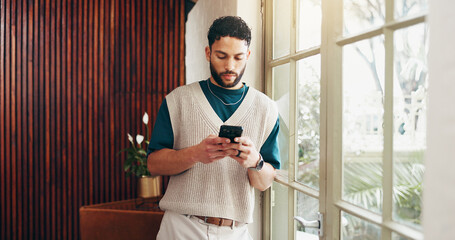 Cellphone, networking and businessman in office with communication, email or contact on mobile app. Technology, connectivity and male creative director with phone for social media or online research.