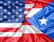 © Snack - American and Puerto Rican flags draped together