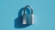 © aryuna99 - A metallic padlock casts a shadow on a light blue background, symbolizing security and protection
