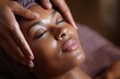 © Popelniushka - Beautiful African Woman Indulging in Natural Skincare and Relaxation at Spa Salon