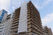 High rise residential building of flats with cladding being replaced with fire resistant materials