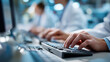 © Kateryna - Healthcare professionals collaborating on medical coding tasks using computer systems medical coding hospital administration healthcare tech with copy space