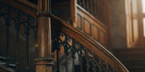 Elegant wooden staircase with intricate metalwork leading to a brighter future, perfect for historical fiction book covers and adding a touch of timeless beauty to your project