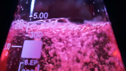 Pink liquid experiment flask