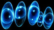 © Alexandra Adele - Vibrant blue glowing orbs representing energy dynamics in a dark background during an abstract scientific exploration