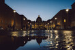 Panoramic night view of St Peter's Basilica with beautiful reflection in Vatican City. Architecture, landmark and attractions of Rome, Italy. High quality photo